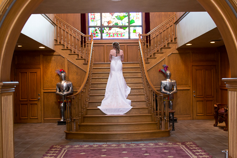 Magi on the staircase at Castle Avalong before the wedding