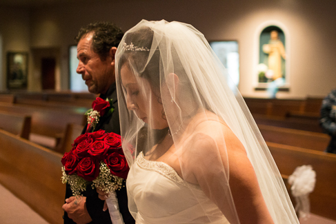 Father escorts the bride down the isle