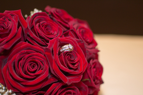 Cyrstal's wedding rings in her wedding bouquet